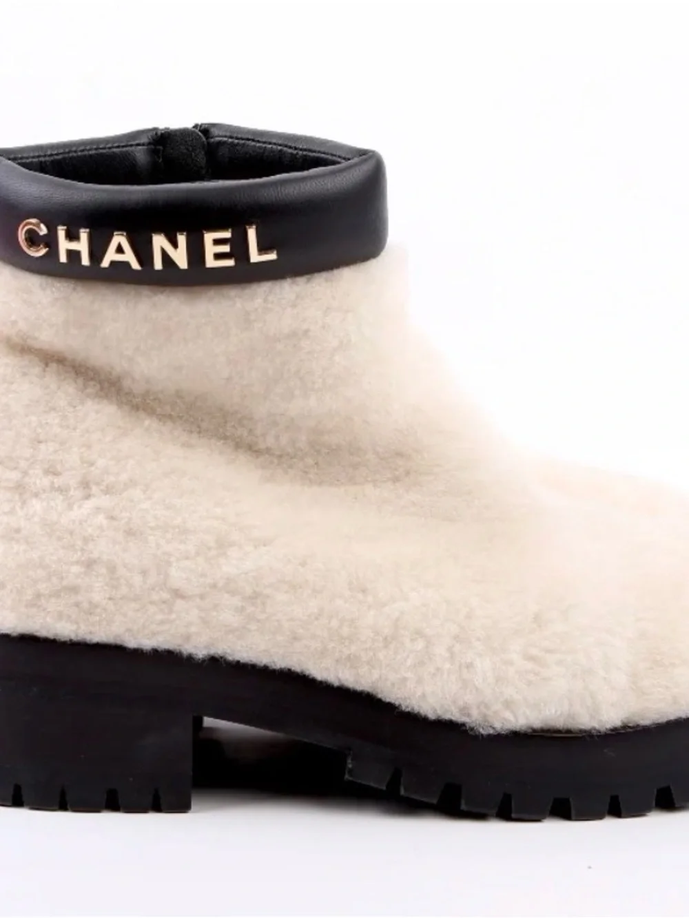 CHANEL Cream Shearling Ankle Boots with Black Leather Trim